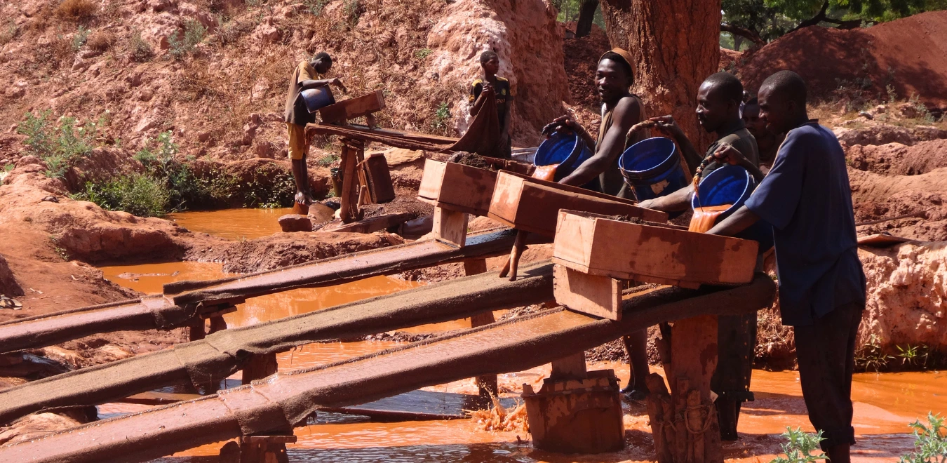 Young men working in Tanzania's artisanal mining